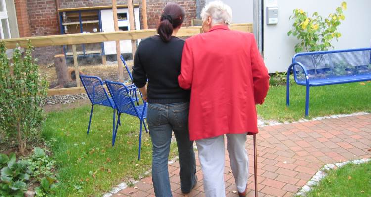 a walk with an elderly person a walk with an elderly person